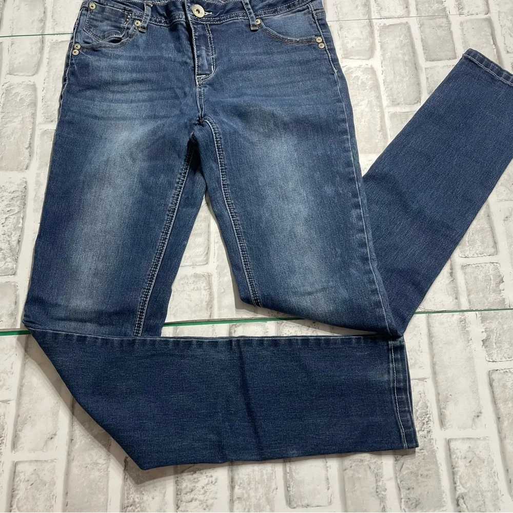 Justice Premium Blue Jeans. Simply low skinny Girls size 16R. Spots. Pre-owned.